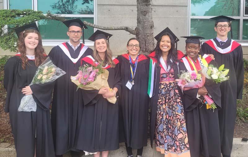 Graduating political science students with their professor
